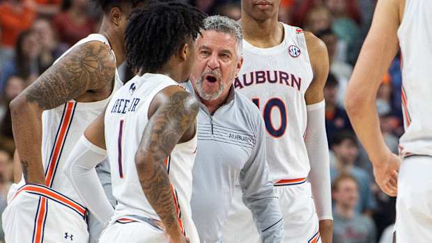 Auburn Tigers head coach Bruce Pearl talks with his team during a break in the action at Auburn Arena in Auburn, Ala., on Wednesday, Feb. 16, 2022. Auburn Tigers lead Vanderbilt Commodores 42-38 at halftime.